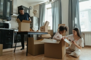 A family unpacking in the new home.